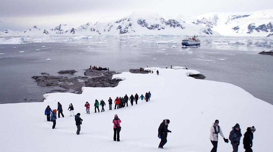 Antarctica with people at a landing Ocean Nova in Antarctica with people at a landing