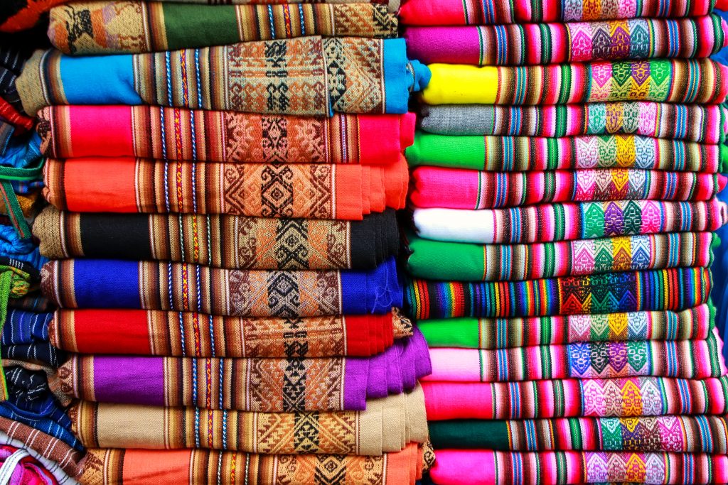 lima market with colourful alpaca wool products displayed credit shuterstock lima market with colourful alpaca wool products displayed credit shuterstock