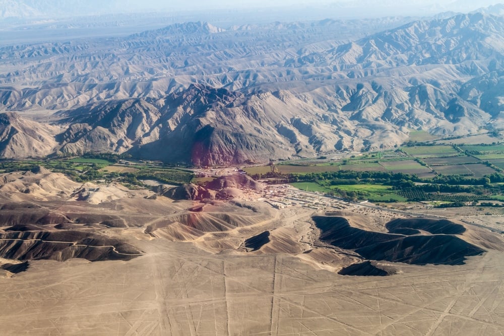 Aerial view of a valley near Nazca, Peru. The famous Nazca Lines are visible as well. Aerial view of a valley near Nazca, Peru. The famous Nazca Lines are visible as well.