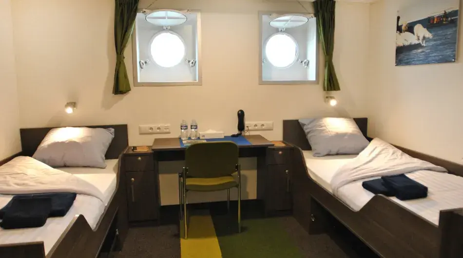 Ortelius Twin Porthole Cabin: ctsy of Oceanwide Expeditions Ortelius Twin Porthole Cabin