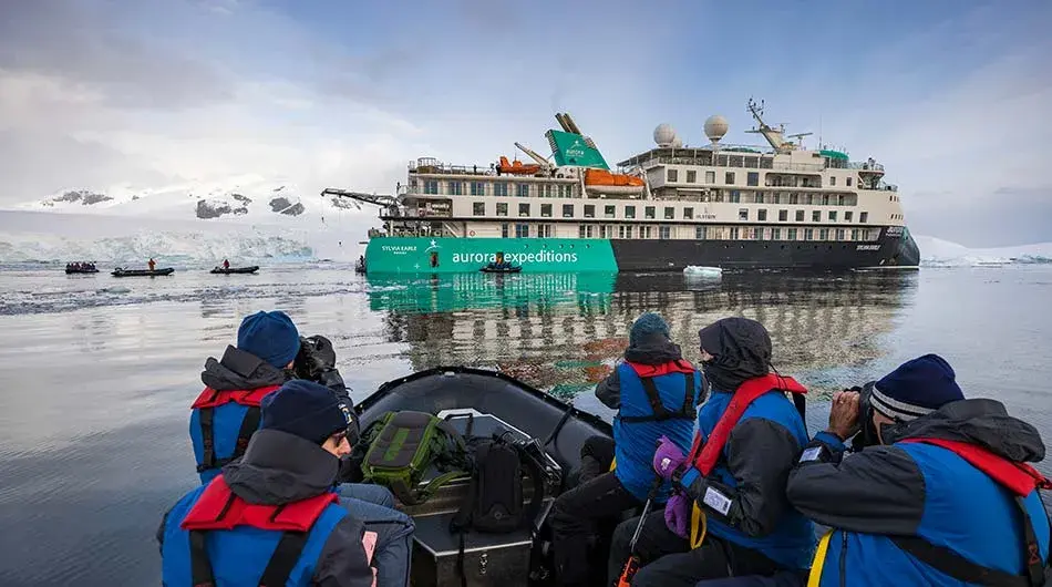 Zodiac-cruising-at-Prospect-Point,-Antarctica,-Richard-I'Anson Zodiac-cruising-at-Prospect-Point,-Antarctica,-Richard-I'Anson