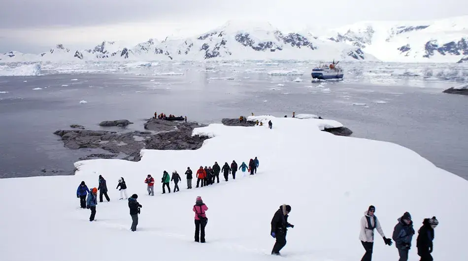 Antarctica with people at a landing Ocean Nova in Antarctica with people at a landing