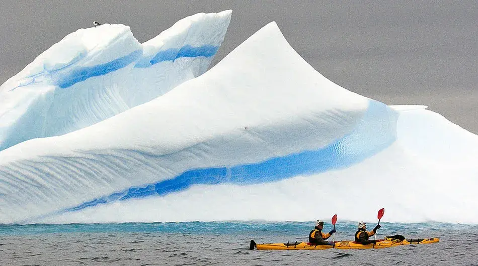 kayaking5 kayaking in front of iceberg Antarctica