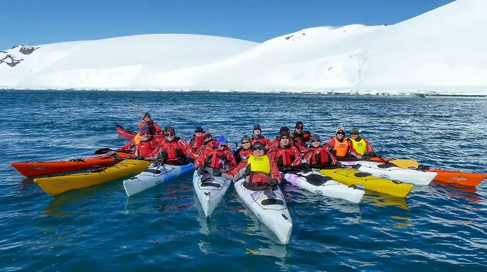 kayaking8 group of kayakers in Antarctica