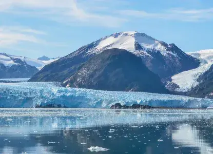 Patagonia-Fjord-Banner.jpg Pia Glacier in Patagonia with Darwin Mountains and calm waters)