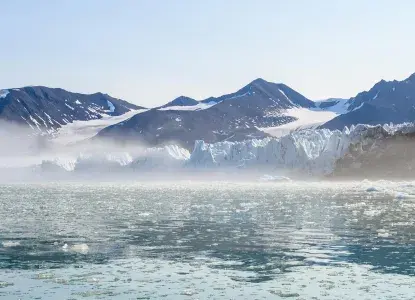 Svalbard_Monacobreen-Glacier-hero.jpg Monacobreen Glacier in icy bay in Arctic Svalbard)